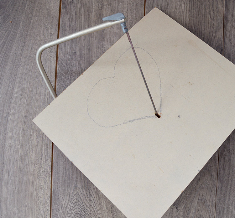 DIY Jewelry Organizer tutorial - use coping saw to cut out shape