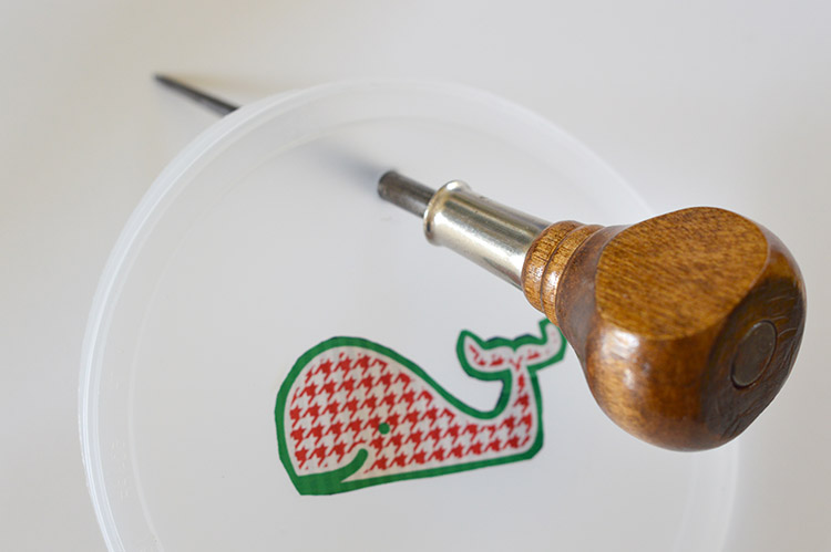 Upcycled Headband organizer tutorial - use an awl to create a hole for hanging