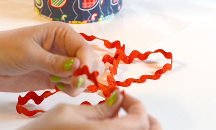 Upcycled Headband organizer tutorial - use ric rac, ribbon, string or yarn to create a hanging loop